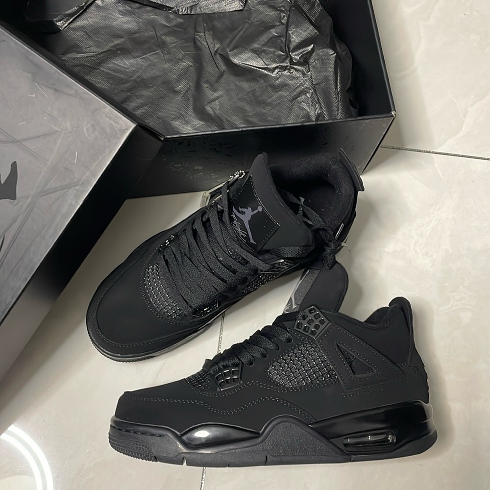 Air Jordan 4 Retro Sneakers In Black